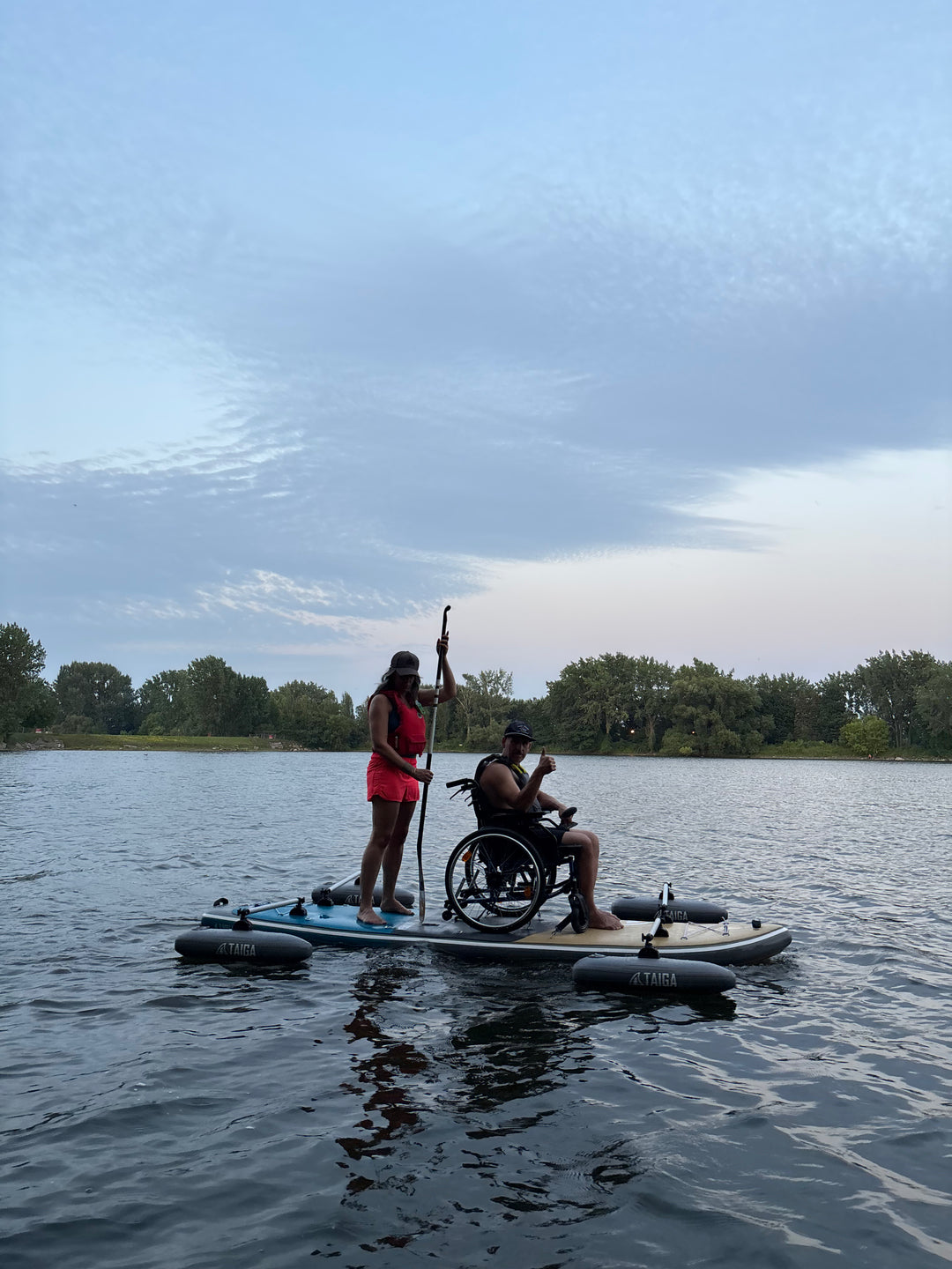 2 Paddlers On The Adaptive SUP