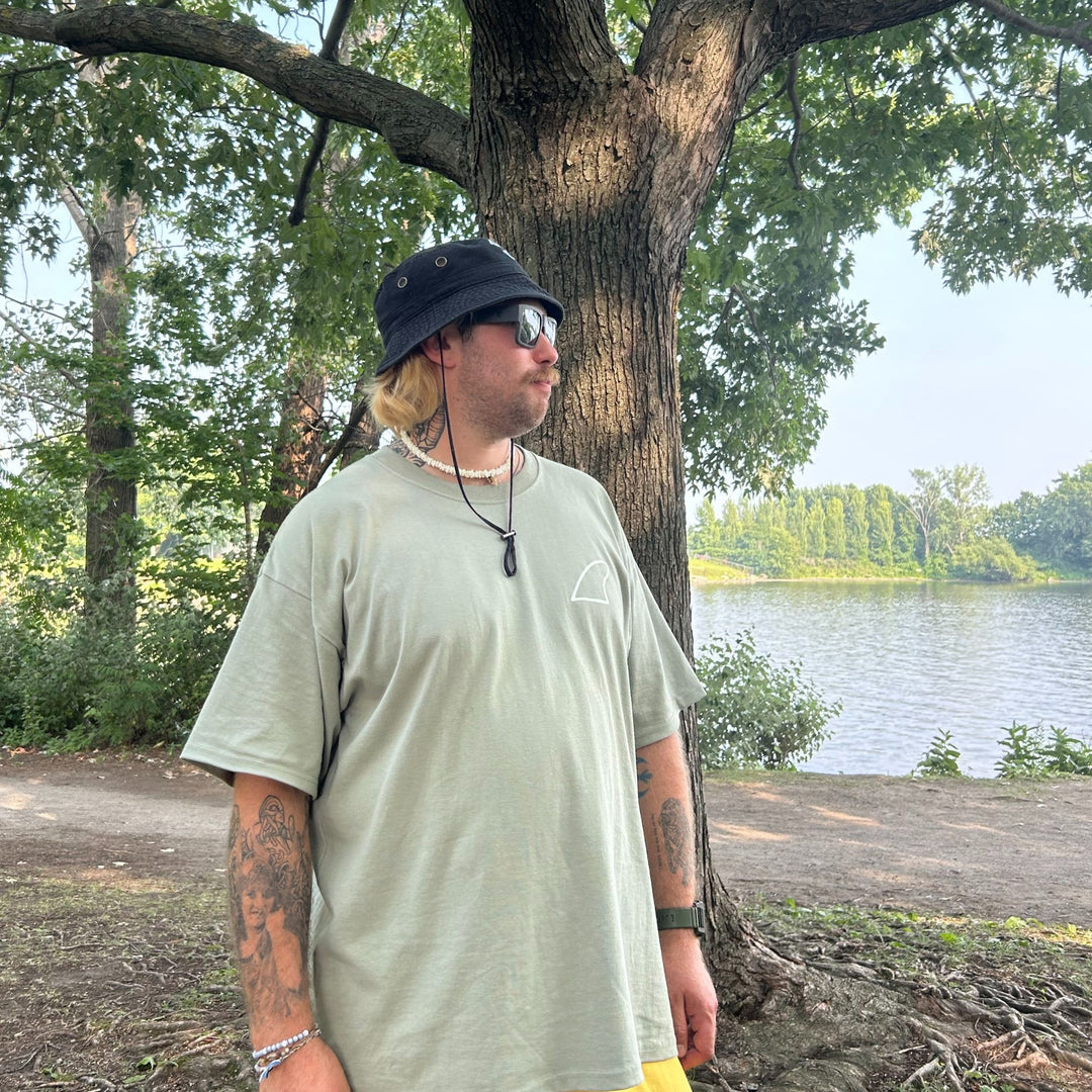 Side View of a man wearing the Boxy Fin T-Shirt