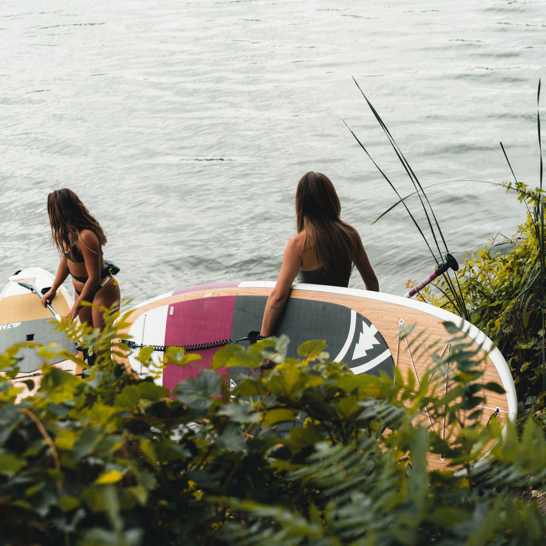 Paddler on the Awen 10'0 Burgundy by TAIGA BOARD