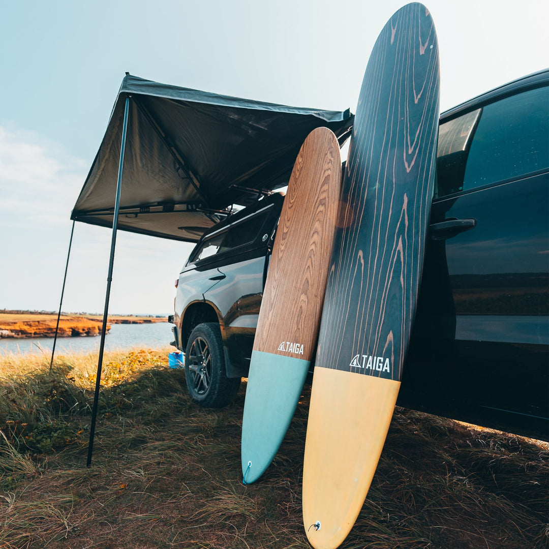 Malibu 7'2" Surf Board Leaning on a Camping VAN 