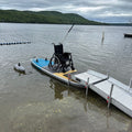 Wheelchair on the TAIGA Adaptive SUP by a ramp on the lake