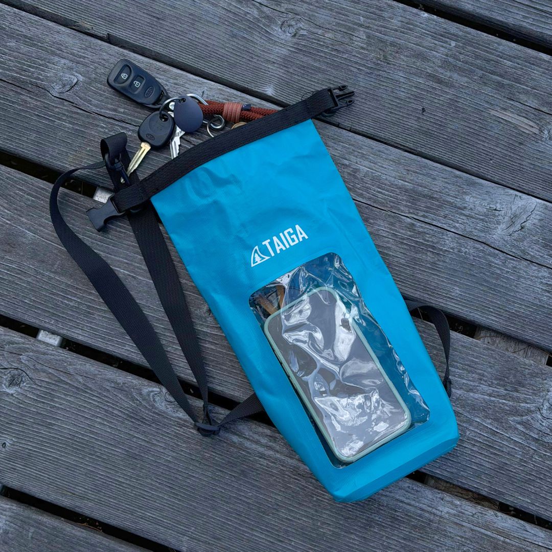 TAIGA Lake Blue Phone Dry Bag with a phone & keys inserted