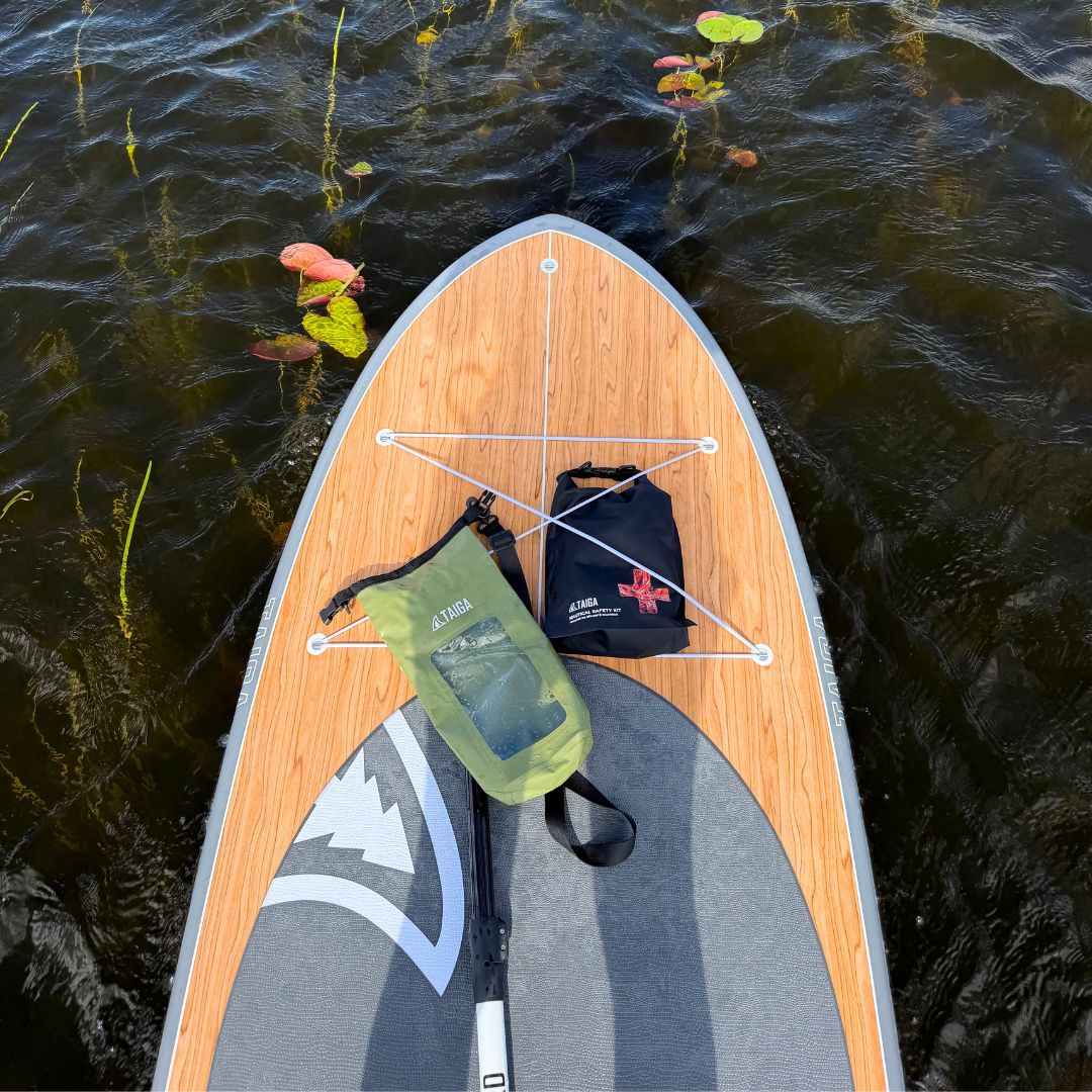 TAIGA SUP with a military green phone dry bag & a Nautical Security Kit