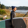 Paddler wearing the TAIGA BOARD BEANIE - Dark Blue