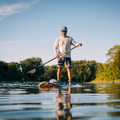 Boy paddling with the Diamond Asymetric Carbon Wood Paddle from TAIGA