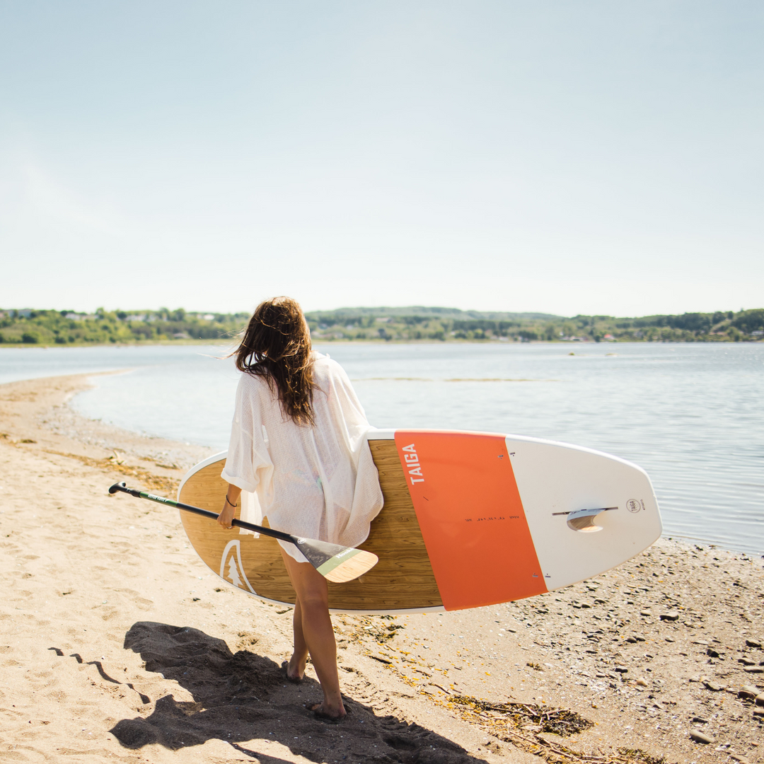 Girl holding the Hana 9'5 salmon