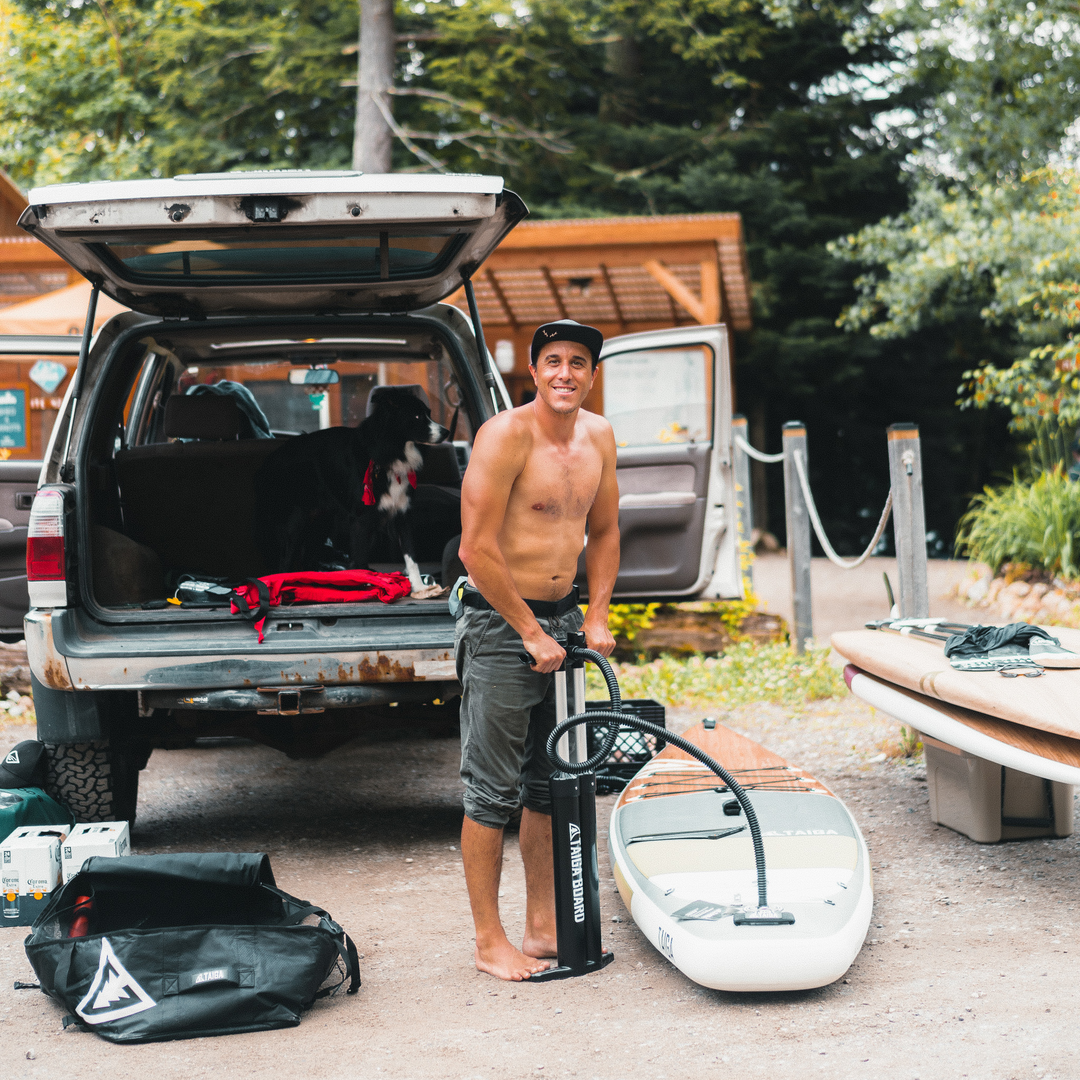 Paddler pumping with the Manual Pump - Triple Action - HP6 - 30 PSI